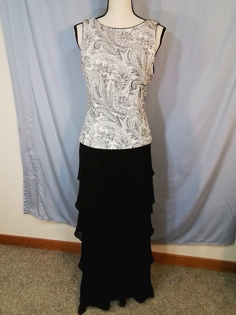 Patra; Silver sparkle and black tired dress